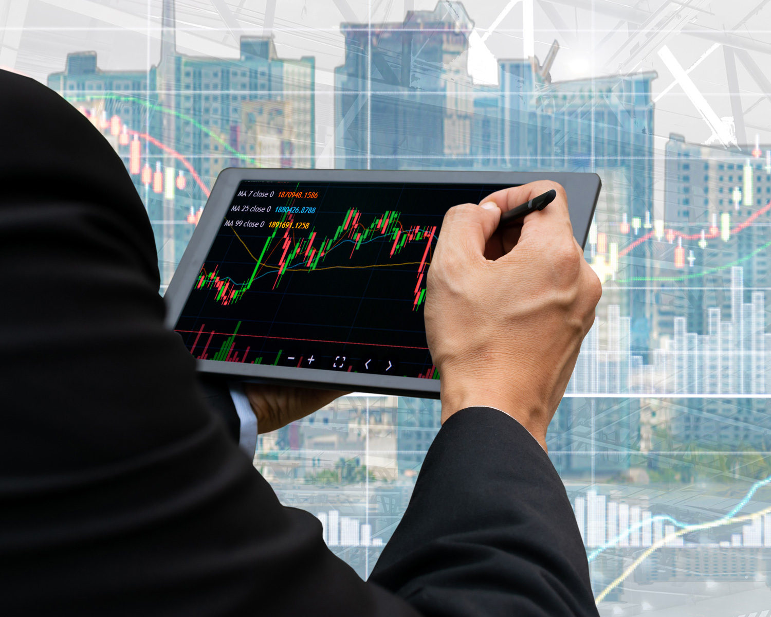 Businessman analyzing stock market charts on computer screens